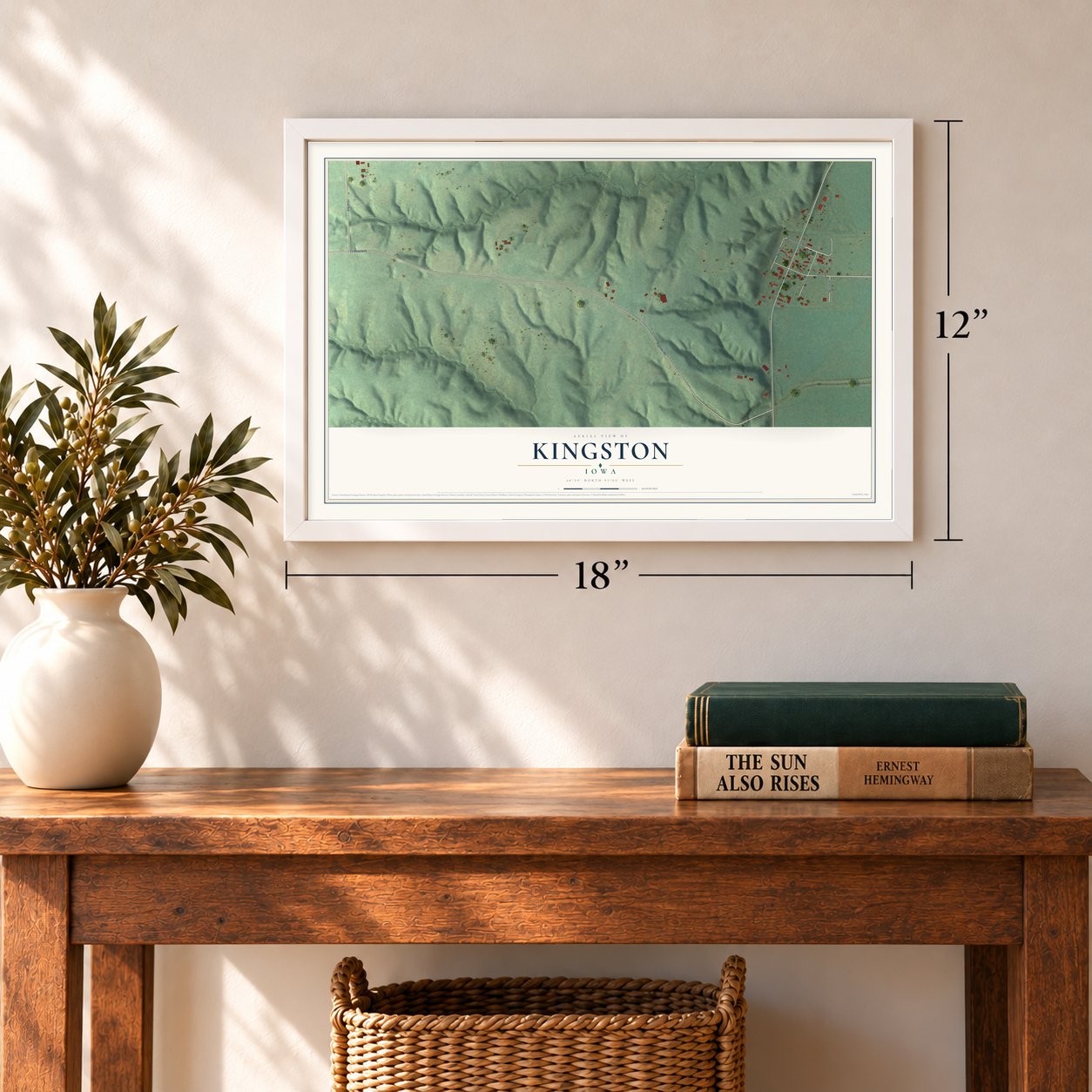 Kingston, Iowa map, 12 x 18 inch print in a white frame in an entryway