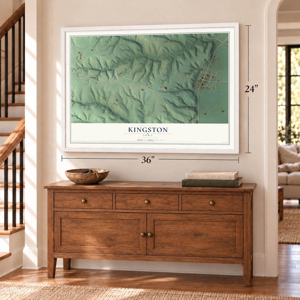 Kingston, Iowa map, 24 x 36 inch print in a white frame above a dresser by a staircase