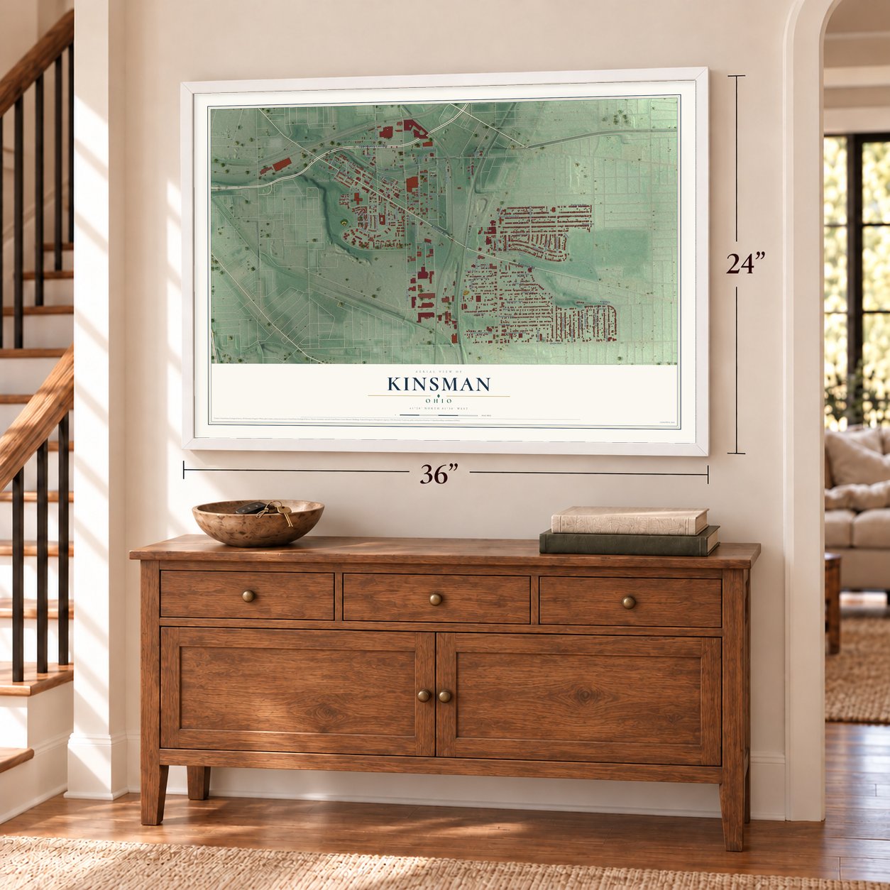 Kinsman, Ohio map, 24 x 36 inch print in a white frame above a dresser by a staircase