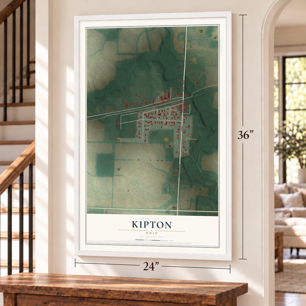 Kipton, Ohio map, 24 x 36 inch print in a white frame by a staircase