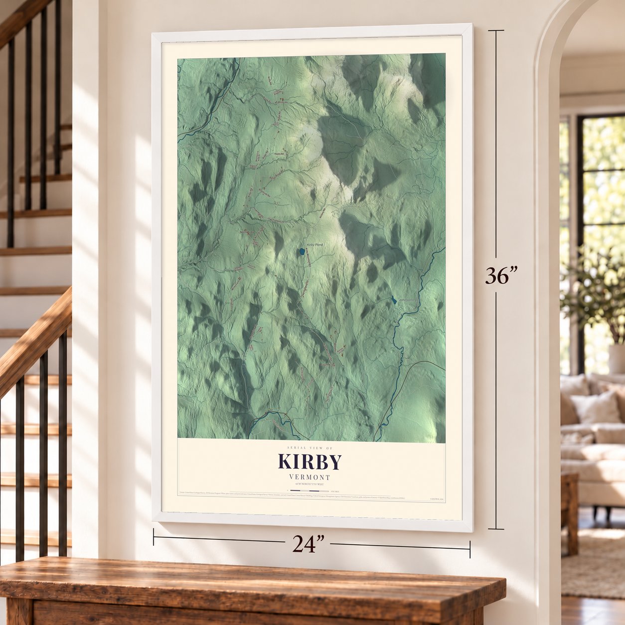 Kirby, Vermont map, 24 x 36 inch print in a white frame by a staircase