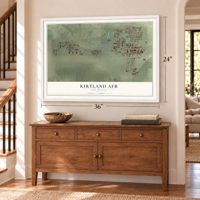 Kirtland AFB, New Mexico map, 24 x 36 inch print in a white frame above a dresser by a staircase