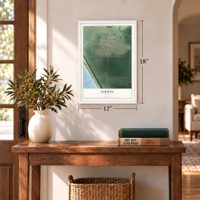 Kirwin, Kansas map, 12 x 18 inch print in a white frame in an entryway