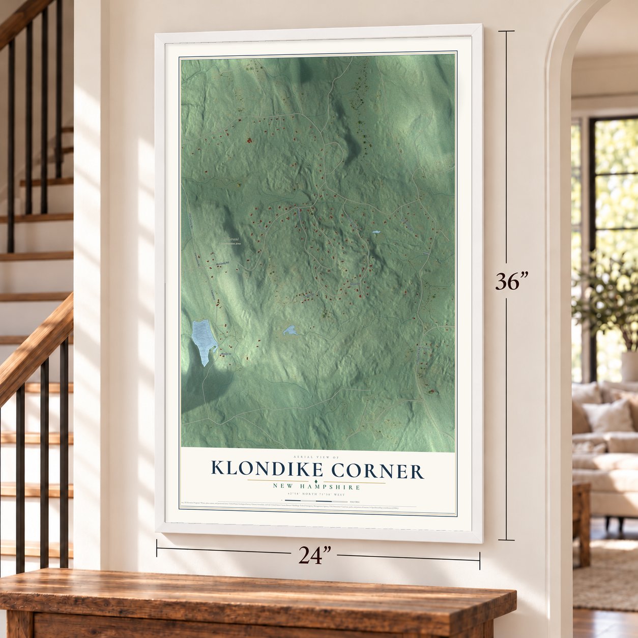 Klondike Corner, New Hampshire map, 24 x 36 inch print in a white frame by a staircase