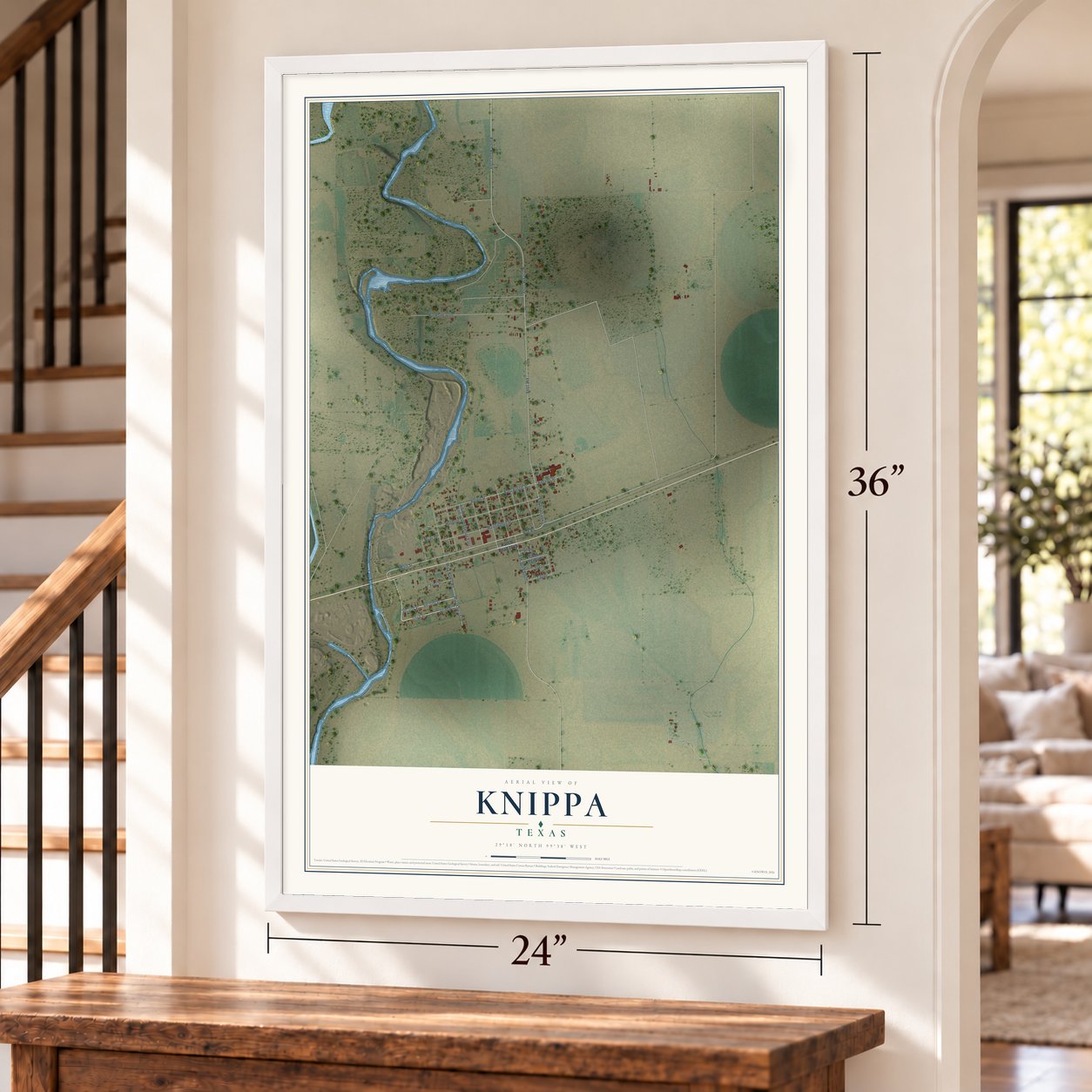 Knippa, Texas map, 24 x 36 inch print in a white frame by a staircase