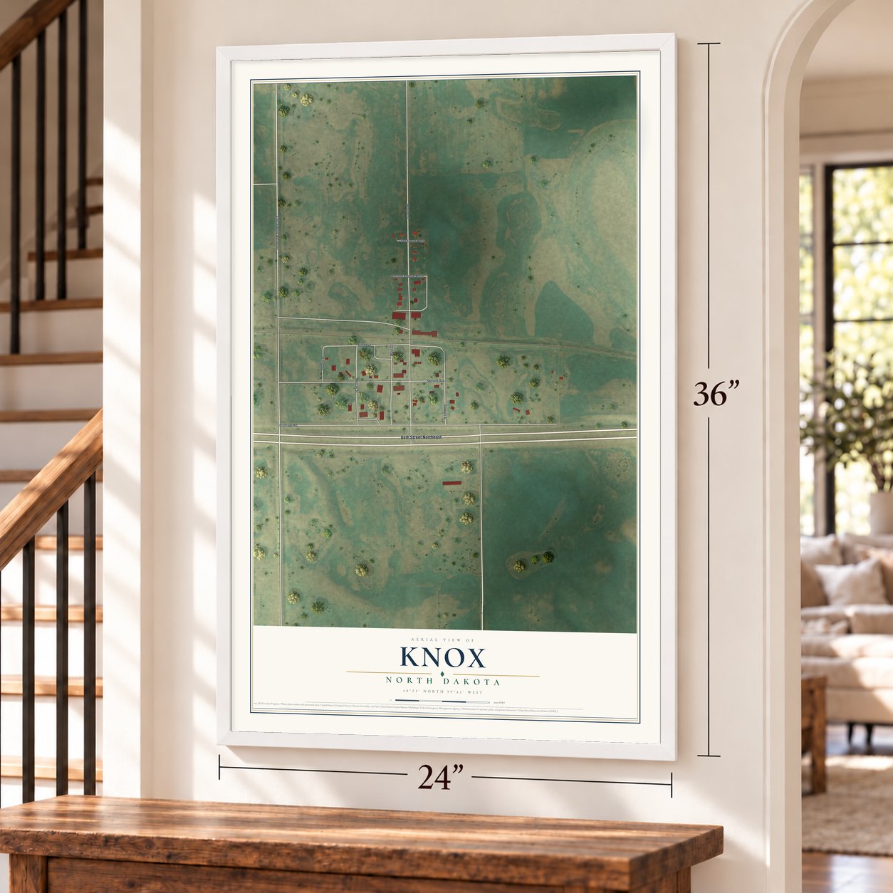 Knox, North Dakota map, 24 x 36 inch print in a white frame by a staircase