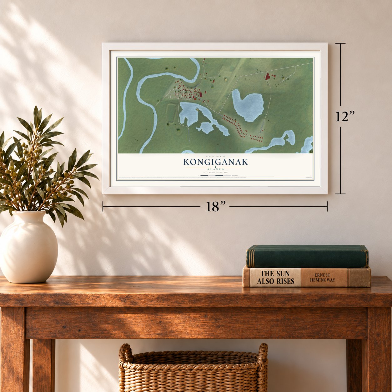 Kongiganak, Alaska map, 12 x 18 inch print in a white frame in an entryway