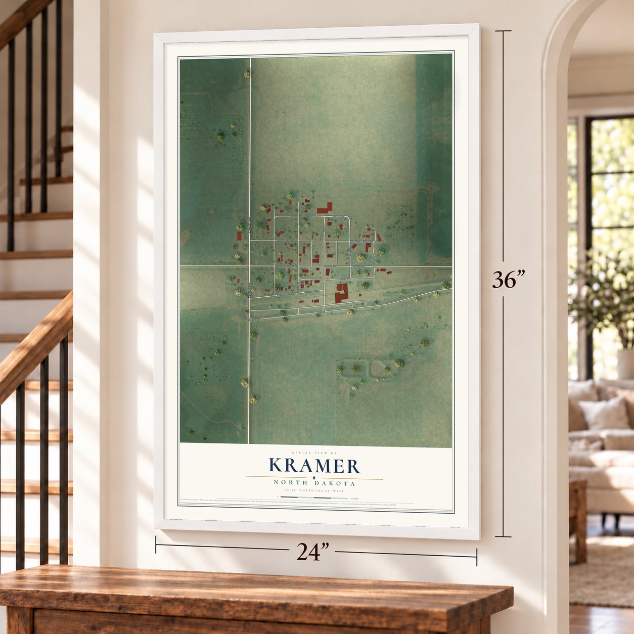 Kramer, North Dakota map, 24 x 36 inch print in a white frame by a staircase