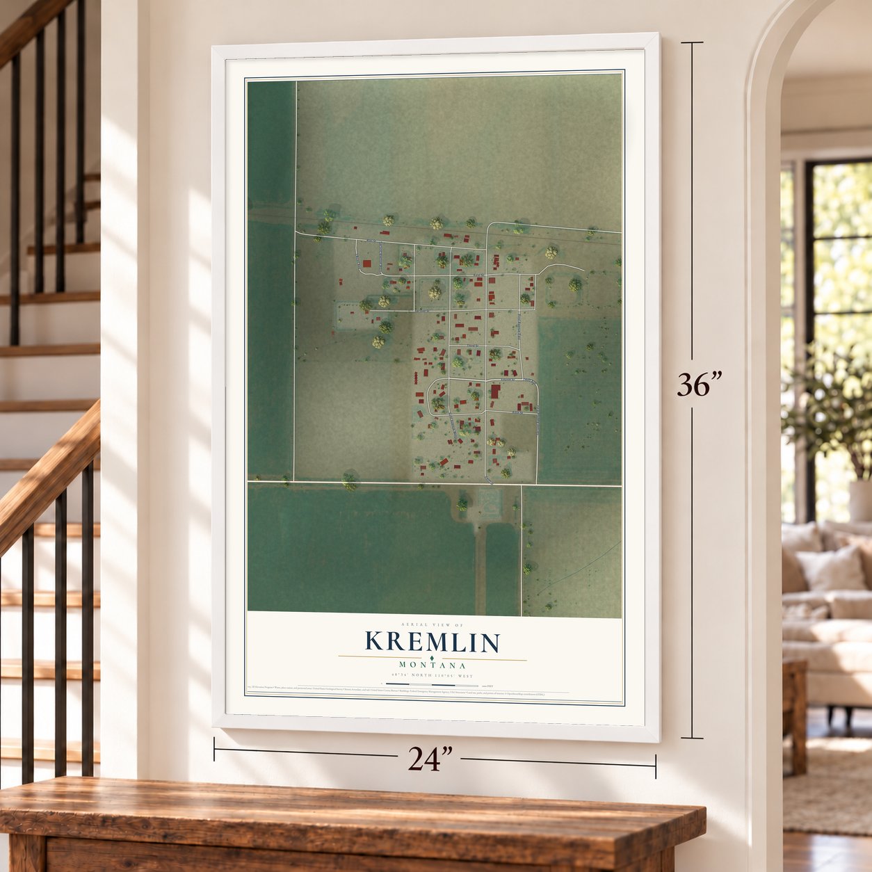 Kremlin, Montana map, 24 x 36 inch print in a white frame by a staircase