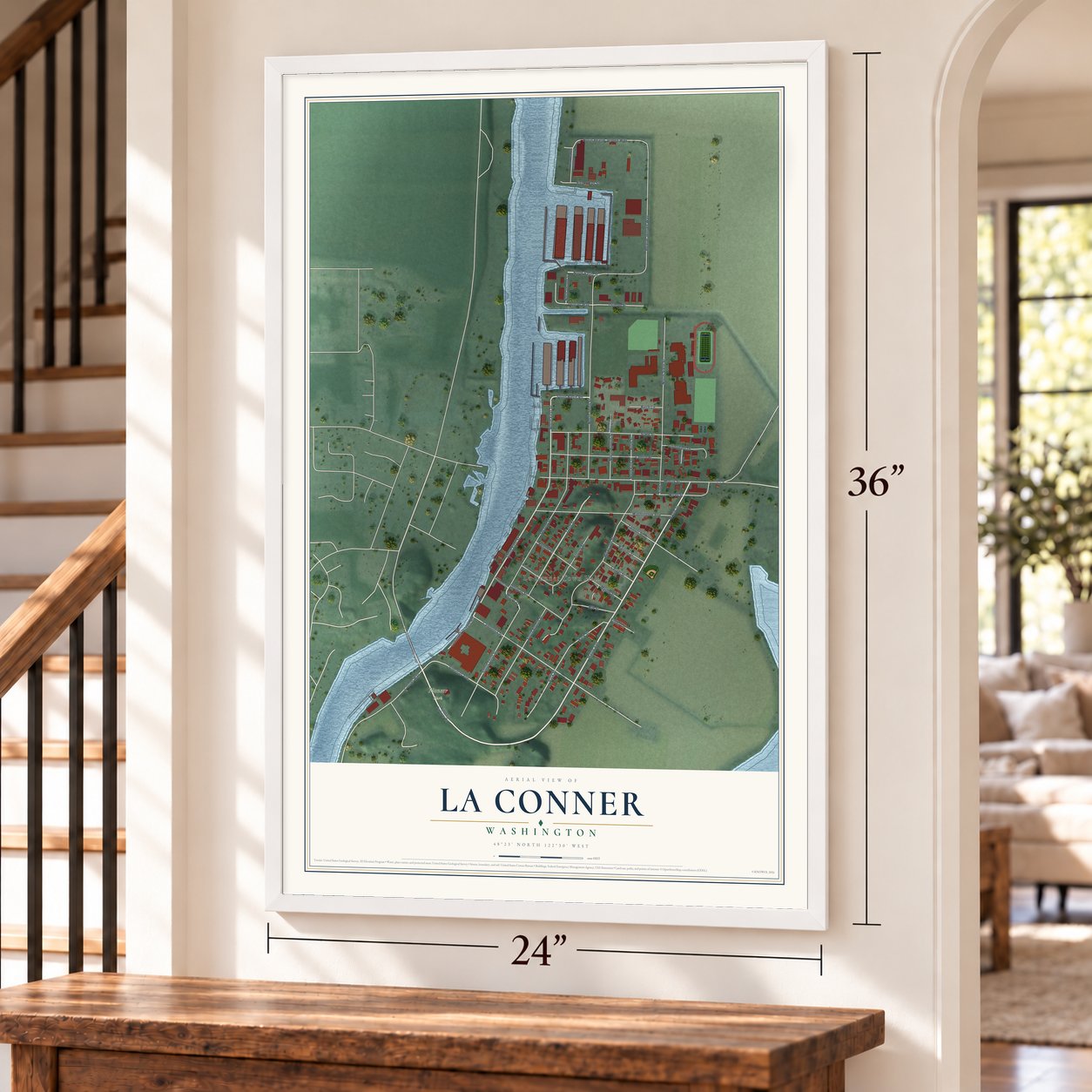 La Conner, Washington map, 24 x 36 inch print in a white frame by a staircase