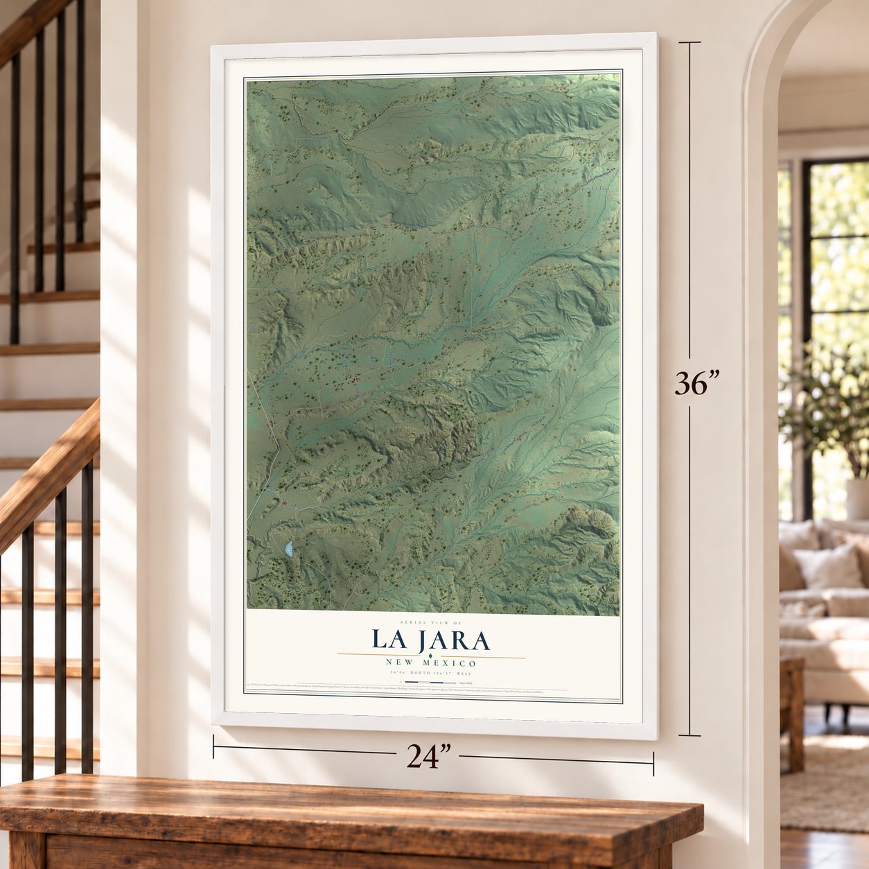 La Jara, New Mexico map, 24 x 36 inch print in a white frame by a staircase