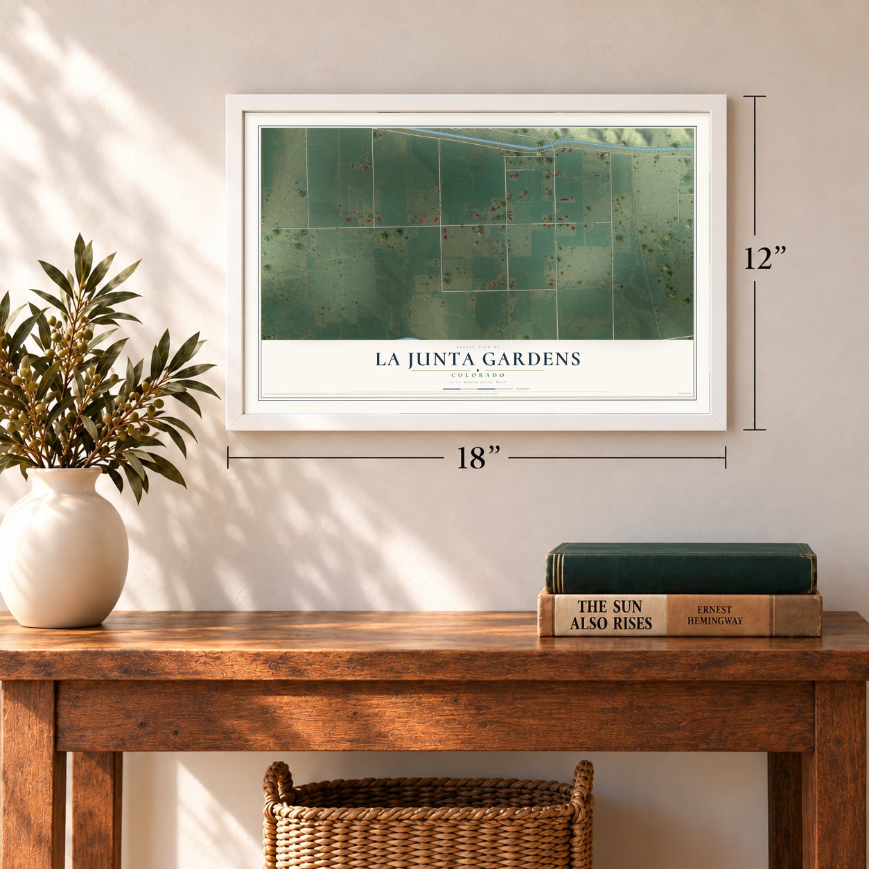 La Junta Gardens, Colorado map, 12 x 18 inch print in a white frame in an entryway