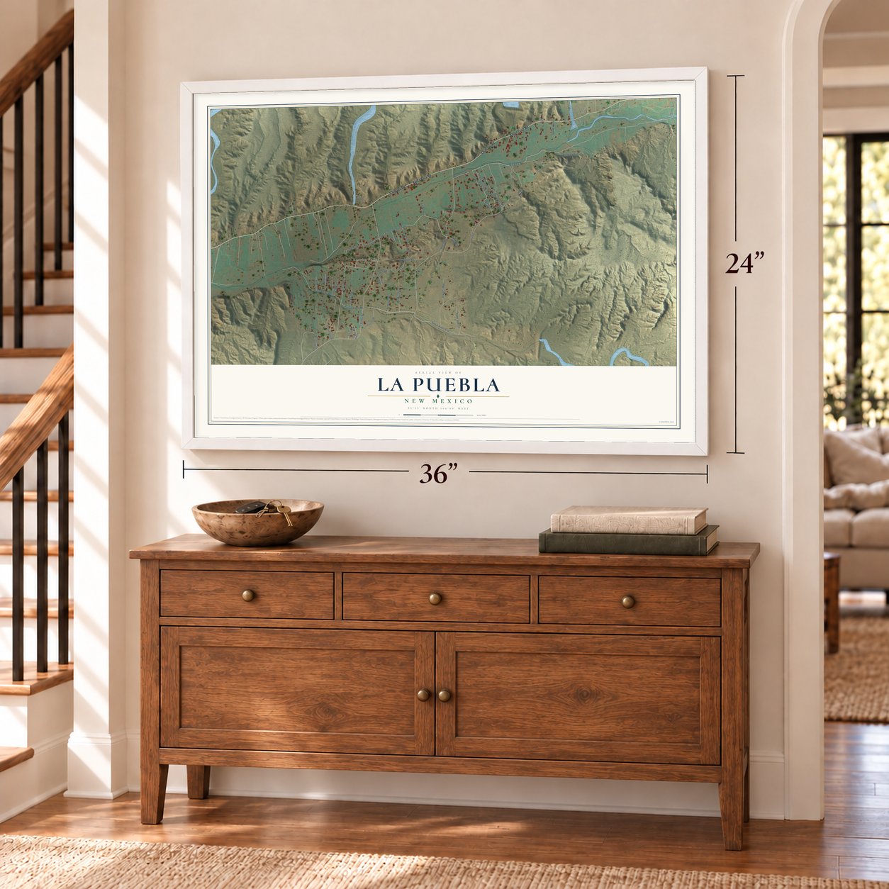 La Puebla, New Mexico map, 24 x 36 inch print in a white frame above a dresser by a staircase