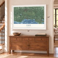 Lajas, Puerto Rico map, 24 x 36 inch print in a white frame above a dresser by a staircase