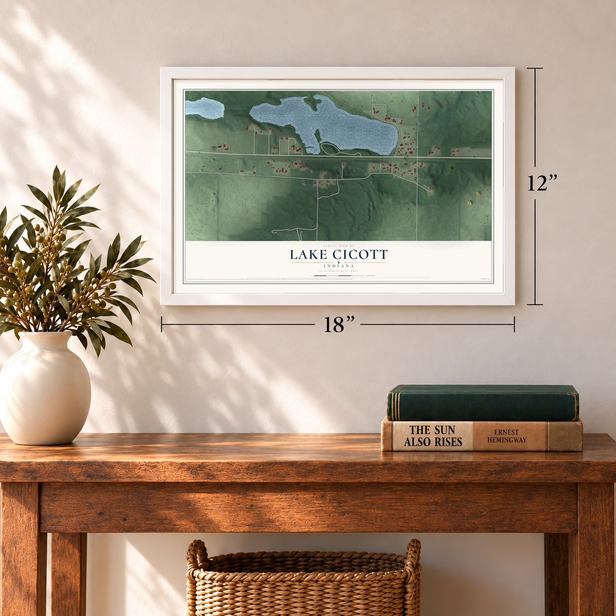 Lake Cicott, Indiana map, 12 x 18 inch print in a white frame in an entryway