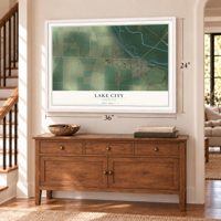 Lake City, Arkansas map, 24 x 36 inch print in a white frame above a dresser by a staircase