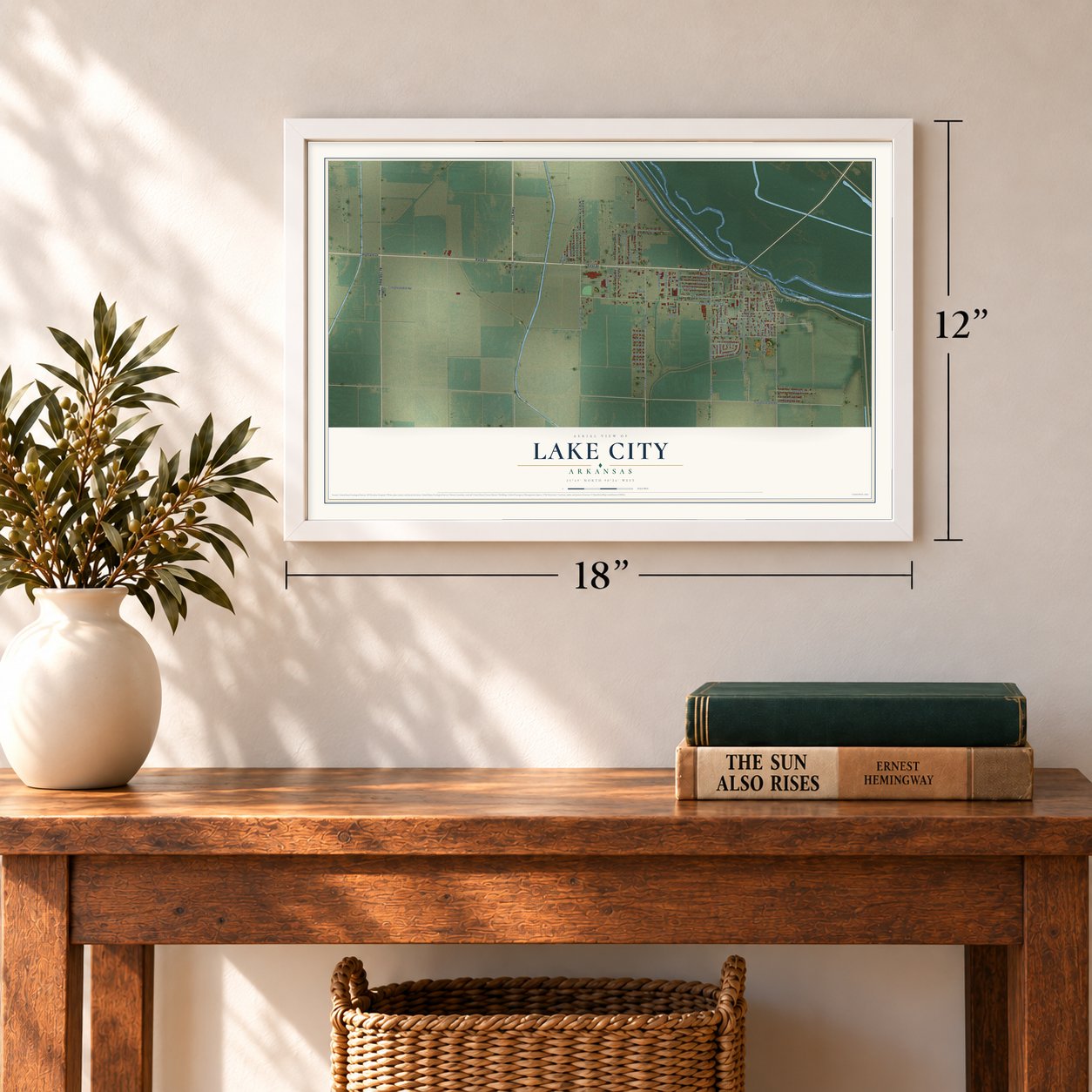 Lake City, Arkansas map, 12 x 18 inch print in a white frame in an entryway