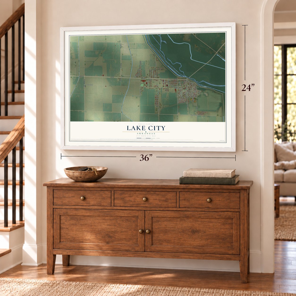 Lake City, Arkansas map, 24 x 36 inch print in a white frame above a dresser by a staircase