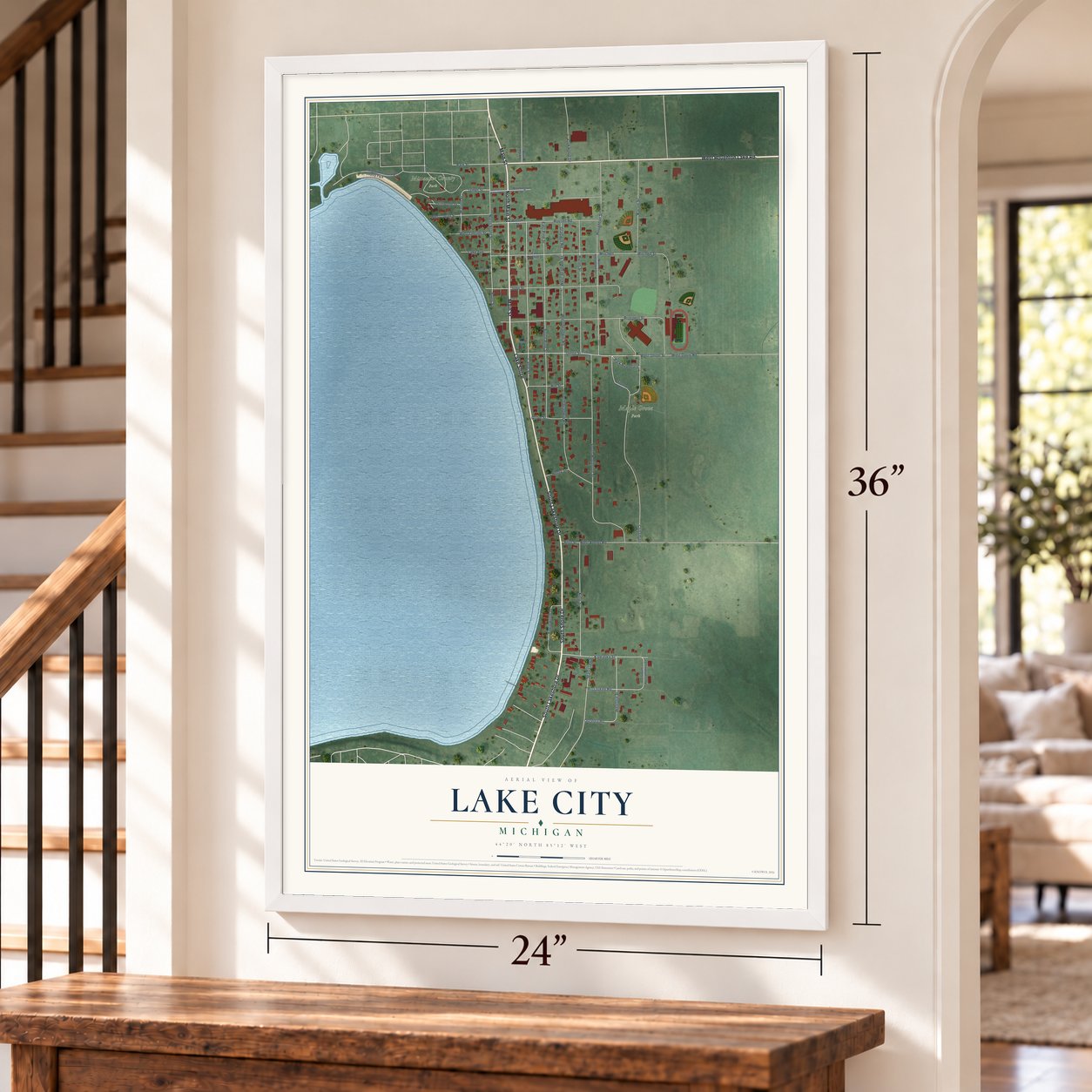 Lake City, Michigan map, 24 x 36 inch print in a white frame by a staircase