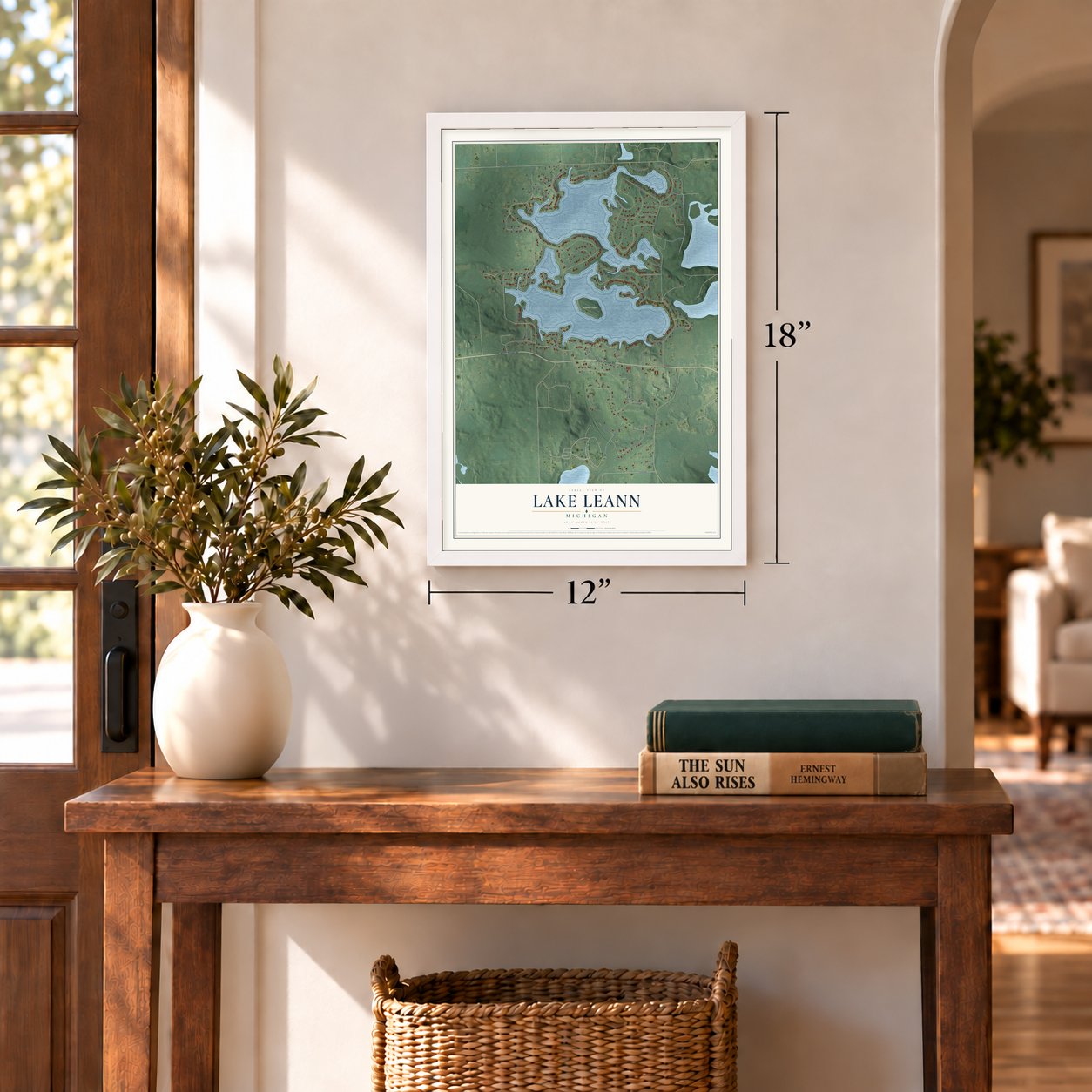 Lake LeAnn, Michigan map, 12 x 18 inch print in a white frame in an entryway