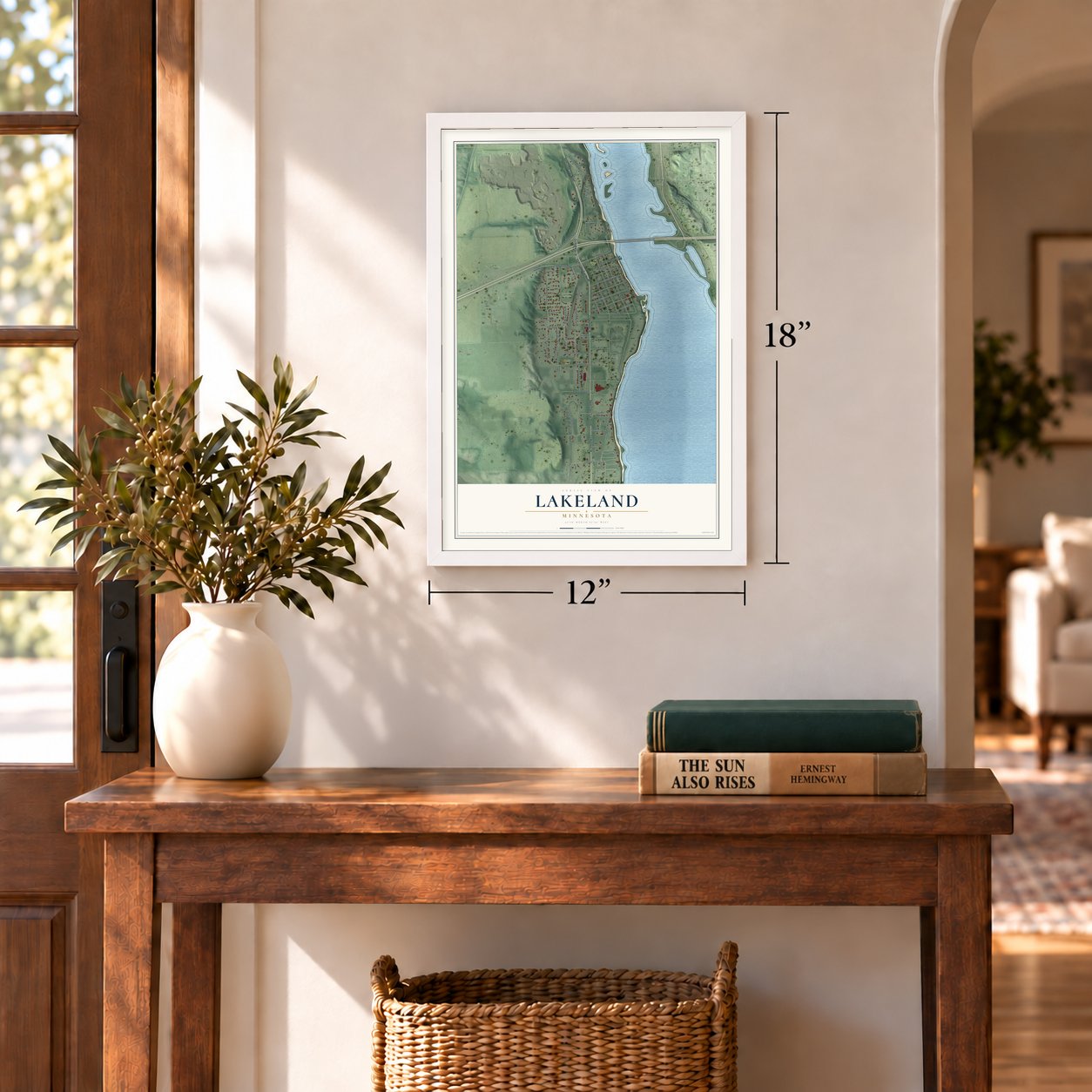 Lakeland, Minnesota map, 12 x 18 inch print in a white frame in an entryway