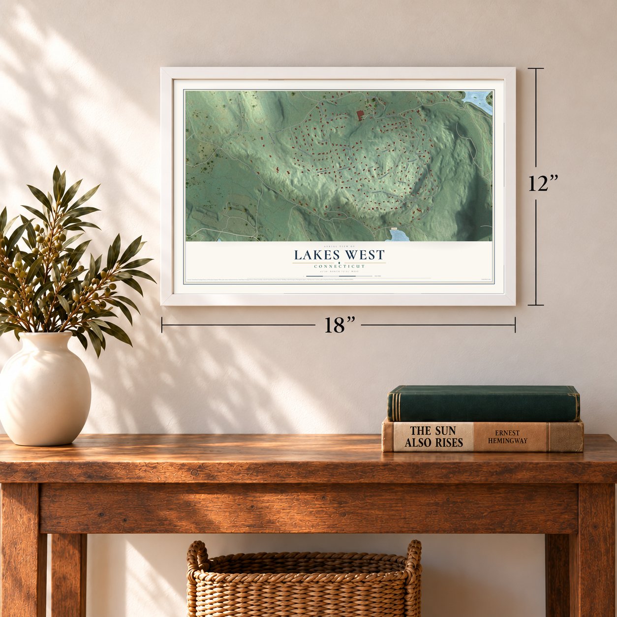 Lakes West, Connecticut map, 12 x 18 inch print in a white frame in an entryway
