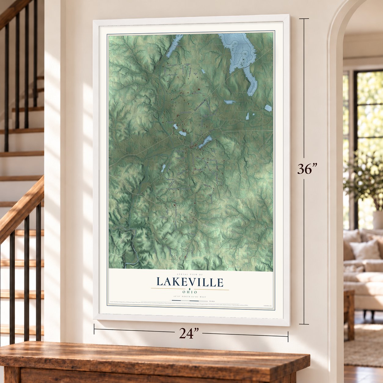 Lakeville, Ohio map, 24 x 36 inch print in a white frame by a staircase