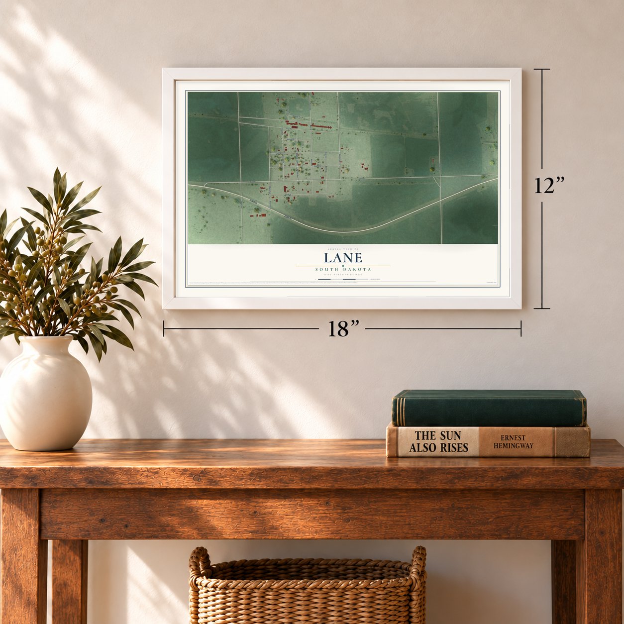 Lane, South Dakota map, 12 x 18 inch print in a white frame in an entryway