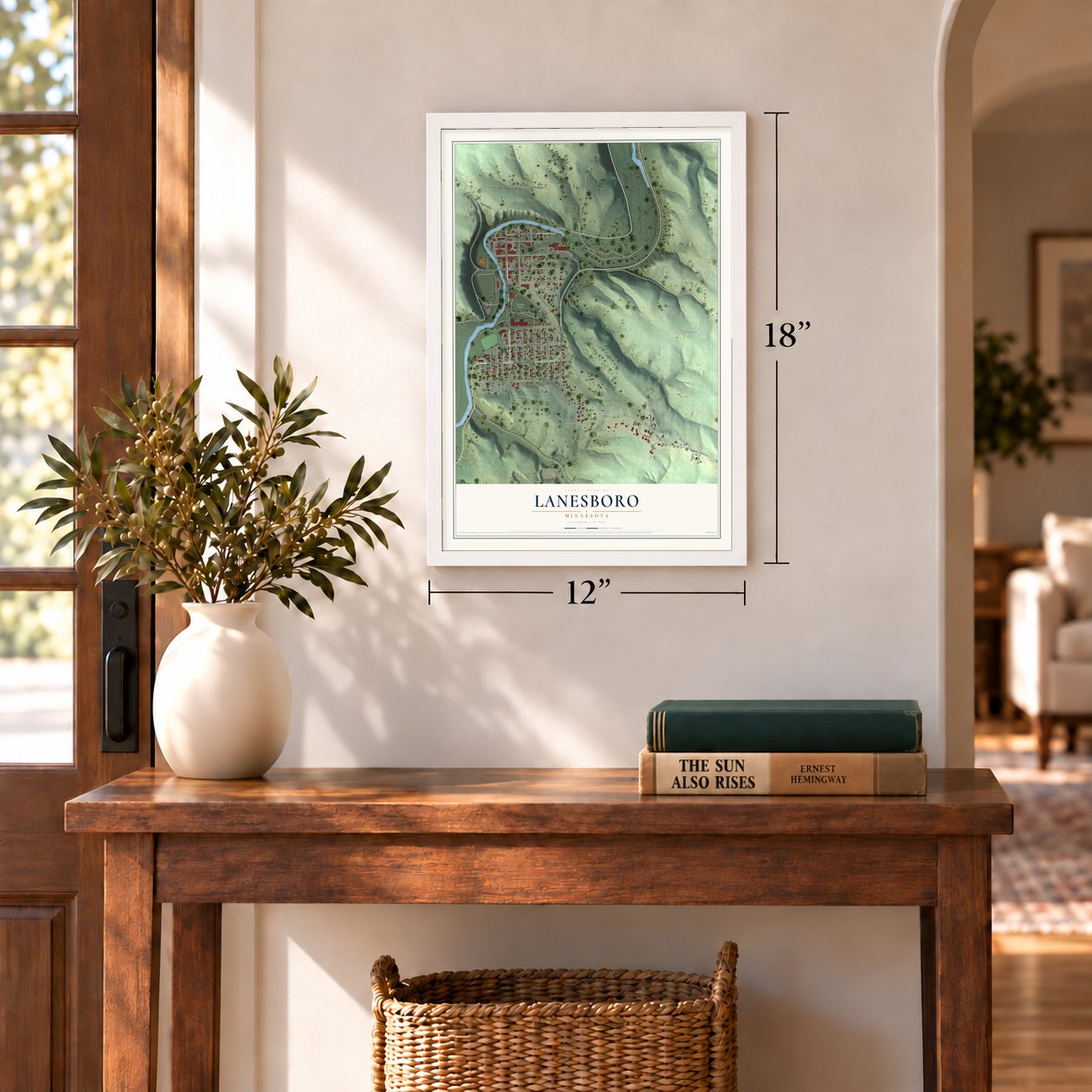 Lanesboro, Minnesota map, 12 x 18 inch print in a white frame in an entryway