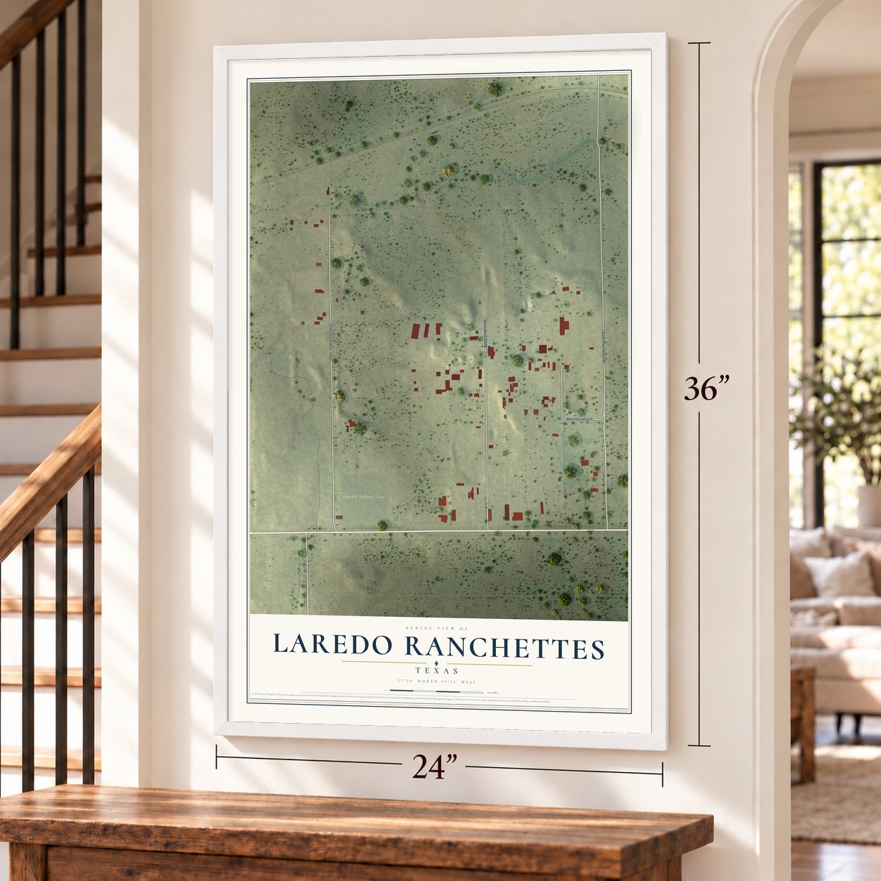 Laredo Ranchettes, Texas map, 24 x 36 inch print in a white frame by a staircase