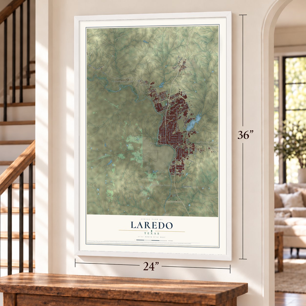 Laredo, Texas map, 24 x 36 inch print in a white frame by a staircase