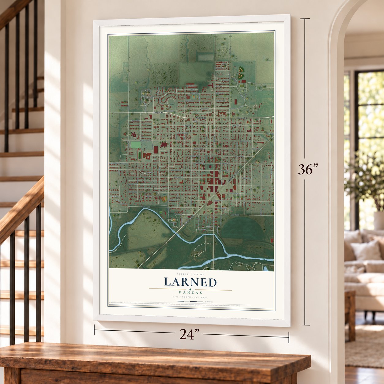 Larned, Kansas map, 24 x 36 inch print in a white frame by a staircase