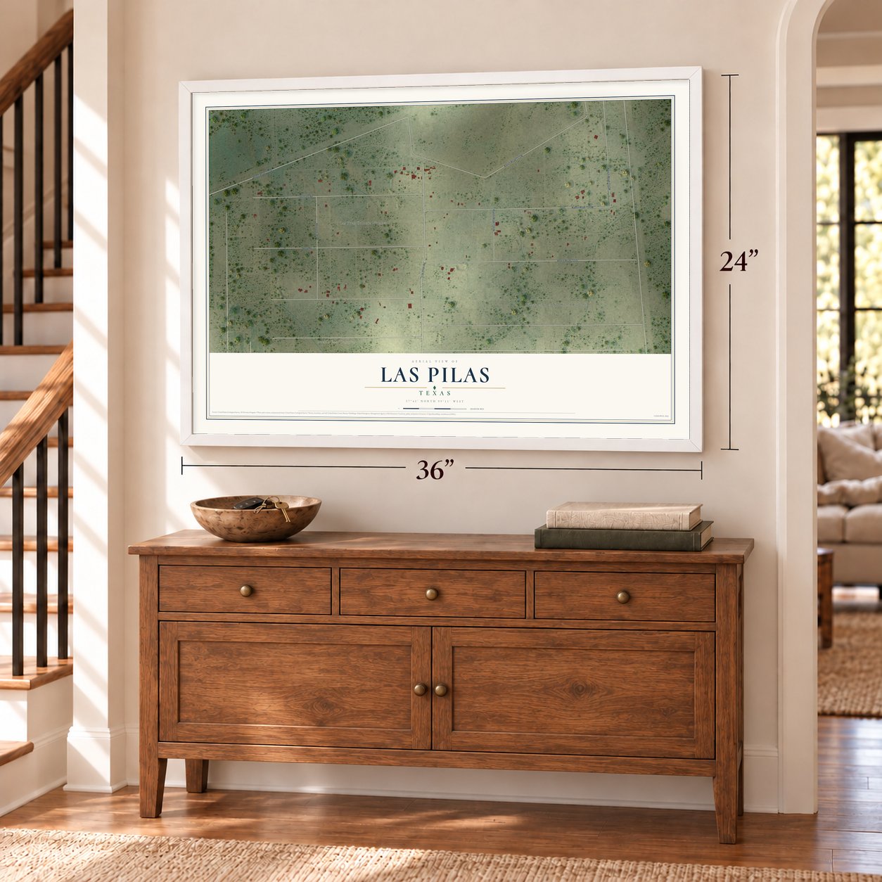 Las Pilas, Texas map, 24 x 36 inch print in a white frame above a dresser by a staircase
