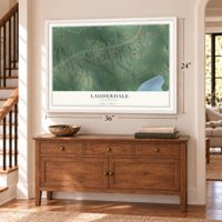 Lauderdale, Mississippi map, 24 x 36 inch print in a white frame above a dresser by a staircase