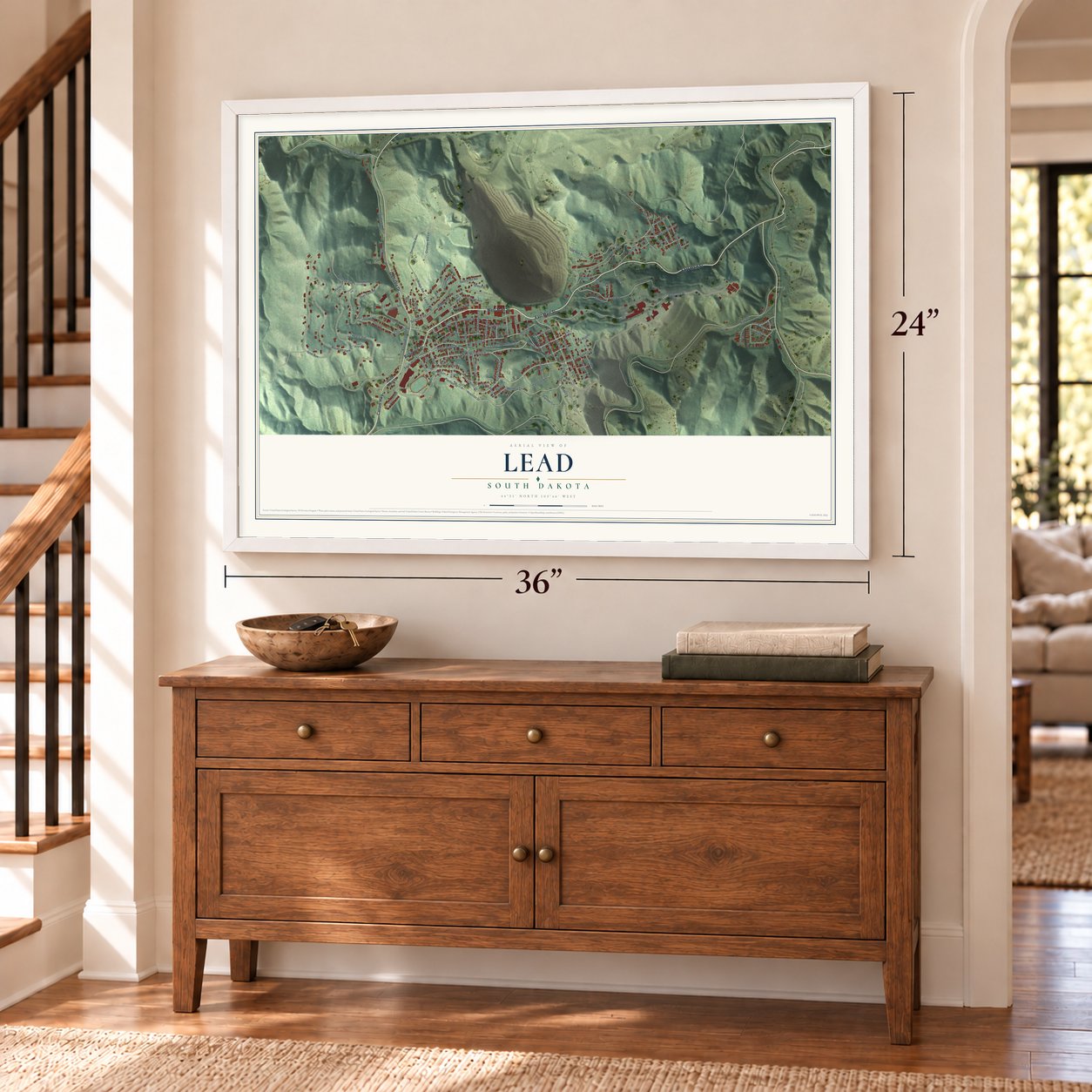 Lead, South Dakota map, 24 x 36 inch print in a white frame above a dresser by a staircase