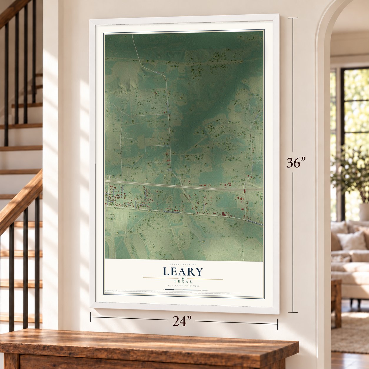 Leary, Texas map, 24 x 36 inch print in a white frame by a staircase