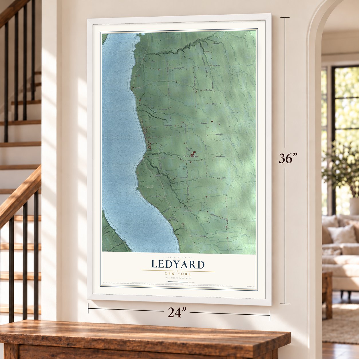 Ledyard, New York map, 24 x 36 inch print in a white frame by a staircase