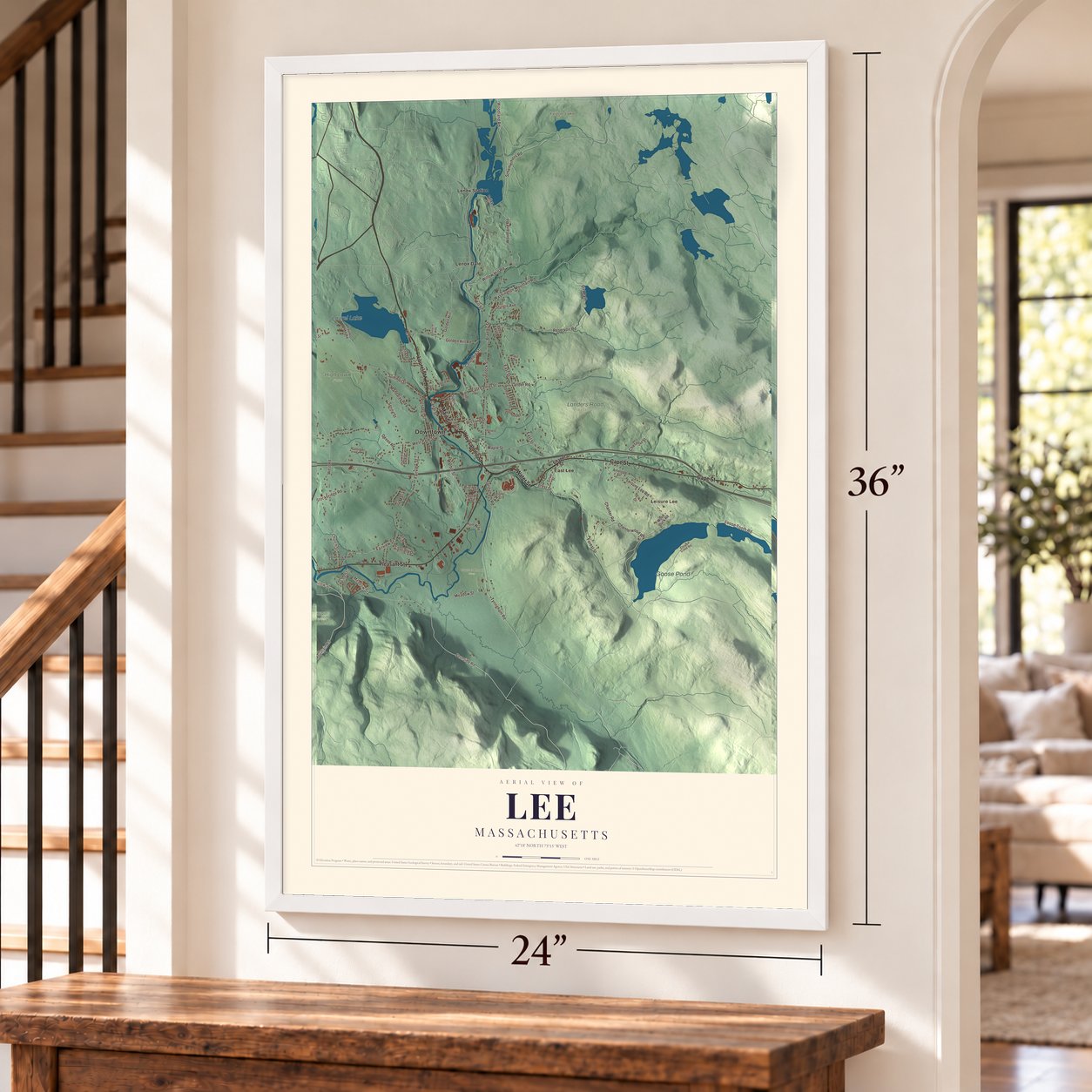 Lee, Massachusetts map, 24 x 36 inch print in a white frame by a staircase