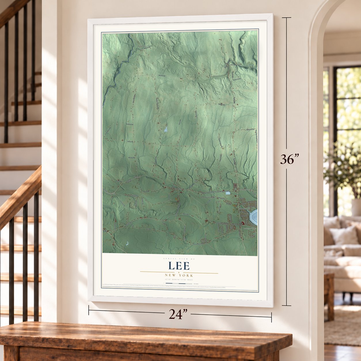 Lee, New York map, 24 x 36 inch print in a white frame by a staircase
