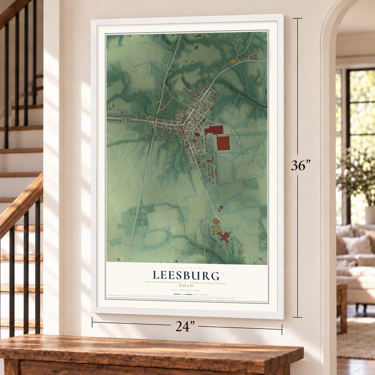 Leesburg, Ohio map, 24 x 36 inch print in a white frame by a staircase