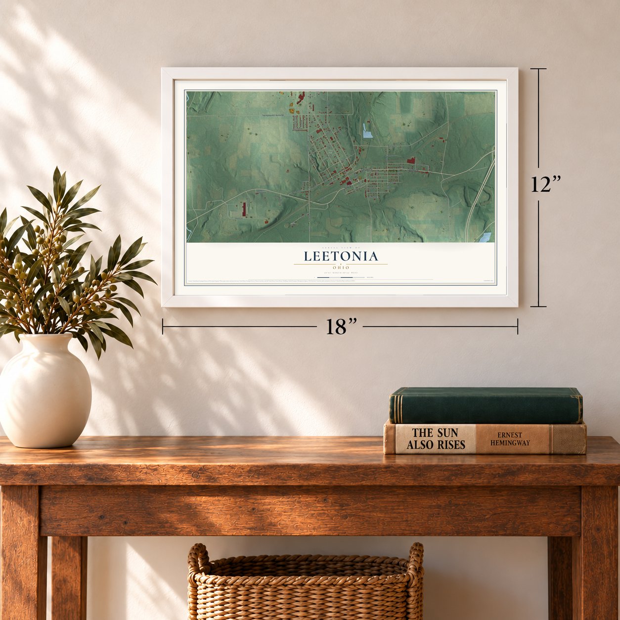 Leetonia, Ohio map, 12 x 18 inch print in a white frame in an entryway
