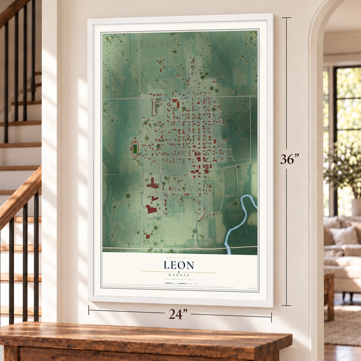 Leon, Kansas map, 24 x 36 inch print in a white frame by a staircase