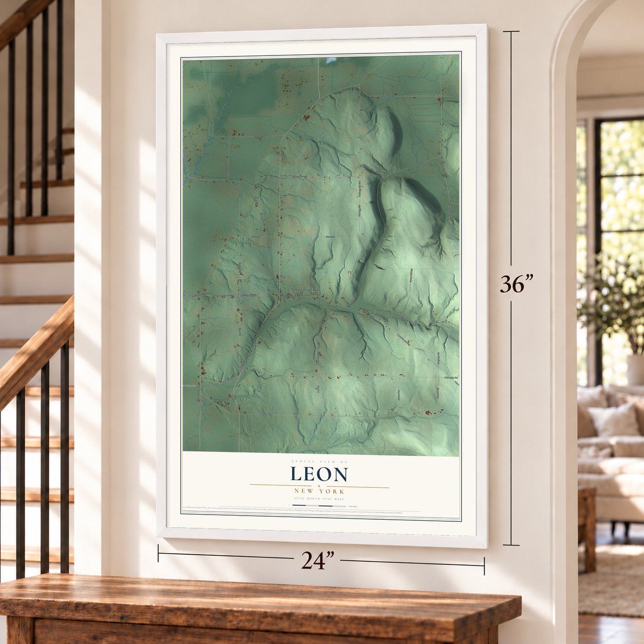 Leon, New York map, 24 x 36 inch print in a white frame by a staircase