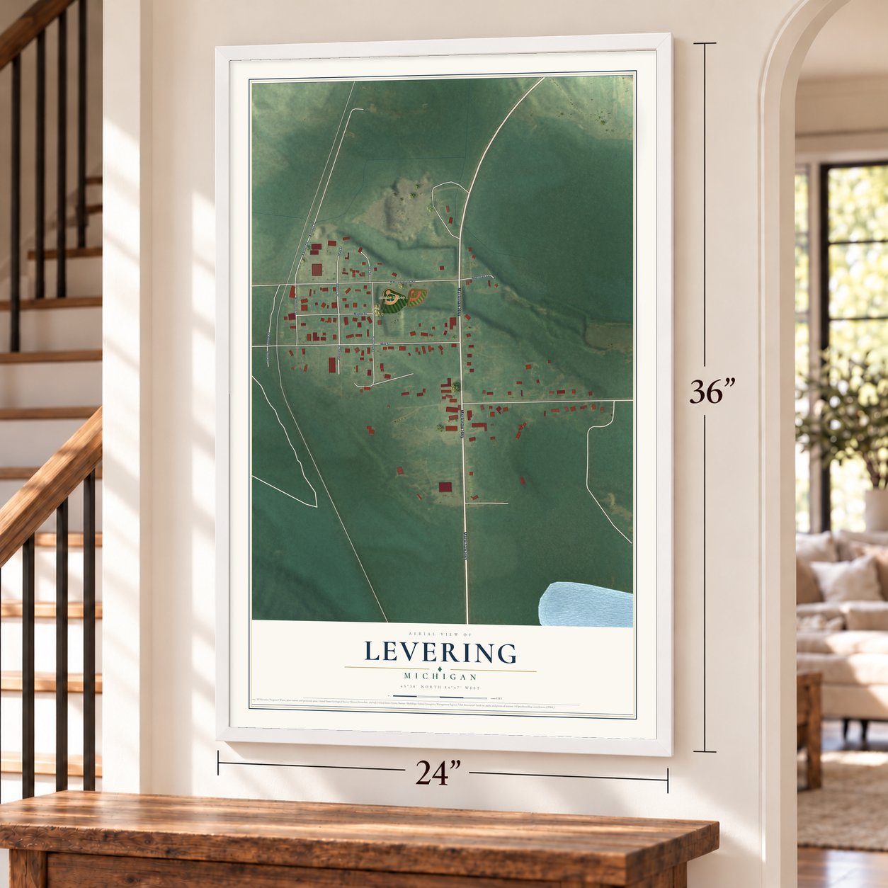 Levering, Michigan map, 24 x 36 inch print in a white frame by a staircase