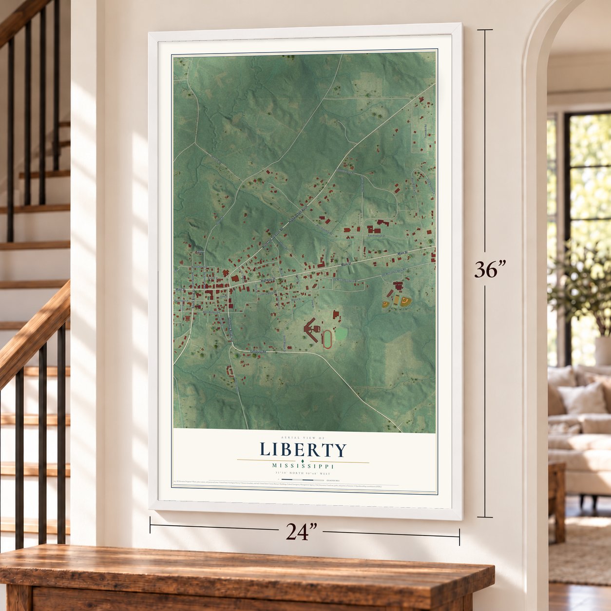 Liberty, Mississippi map, 24 x 36 inch print in a white frame by a staircase