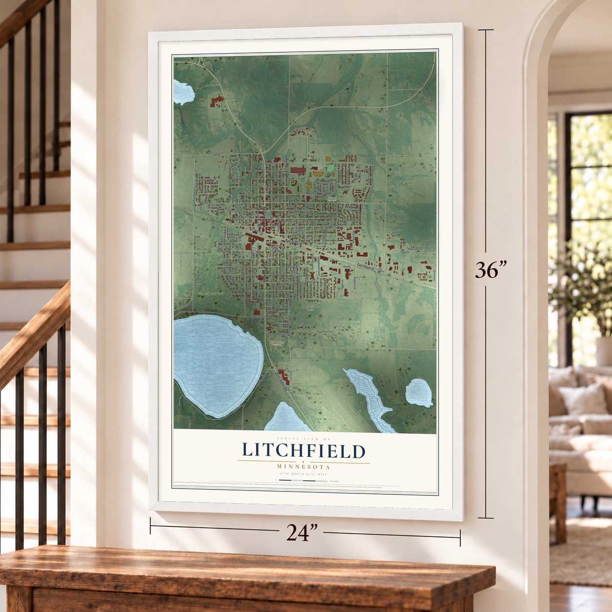 Litchfield, Minnesota map, 24 x 36 inch print in a white frame by a staircase