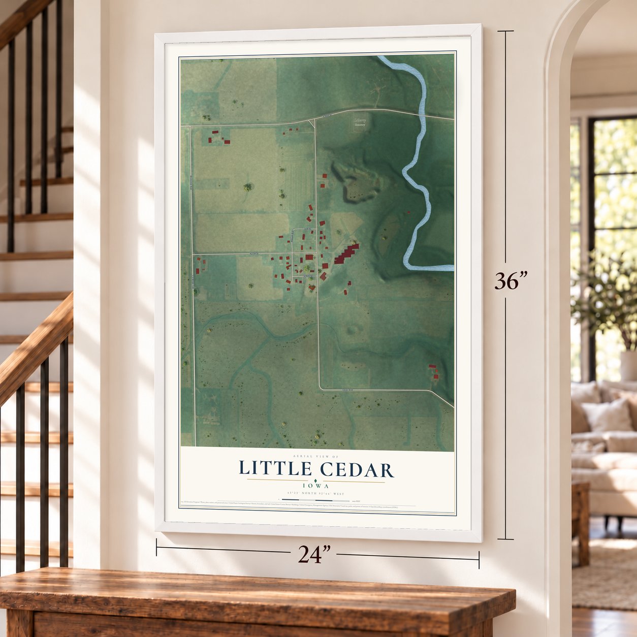 Little Cedar, Iowa map, 24 x 36 inch print in a white frame by a staircase