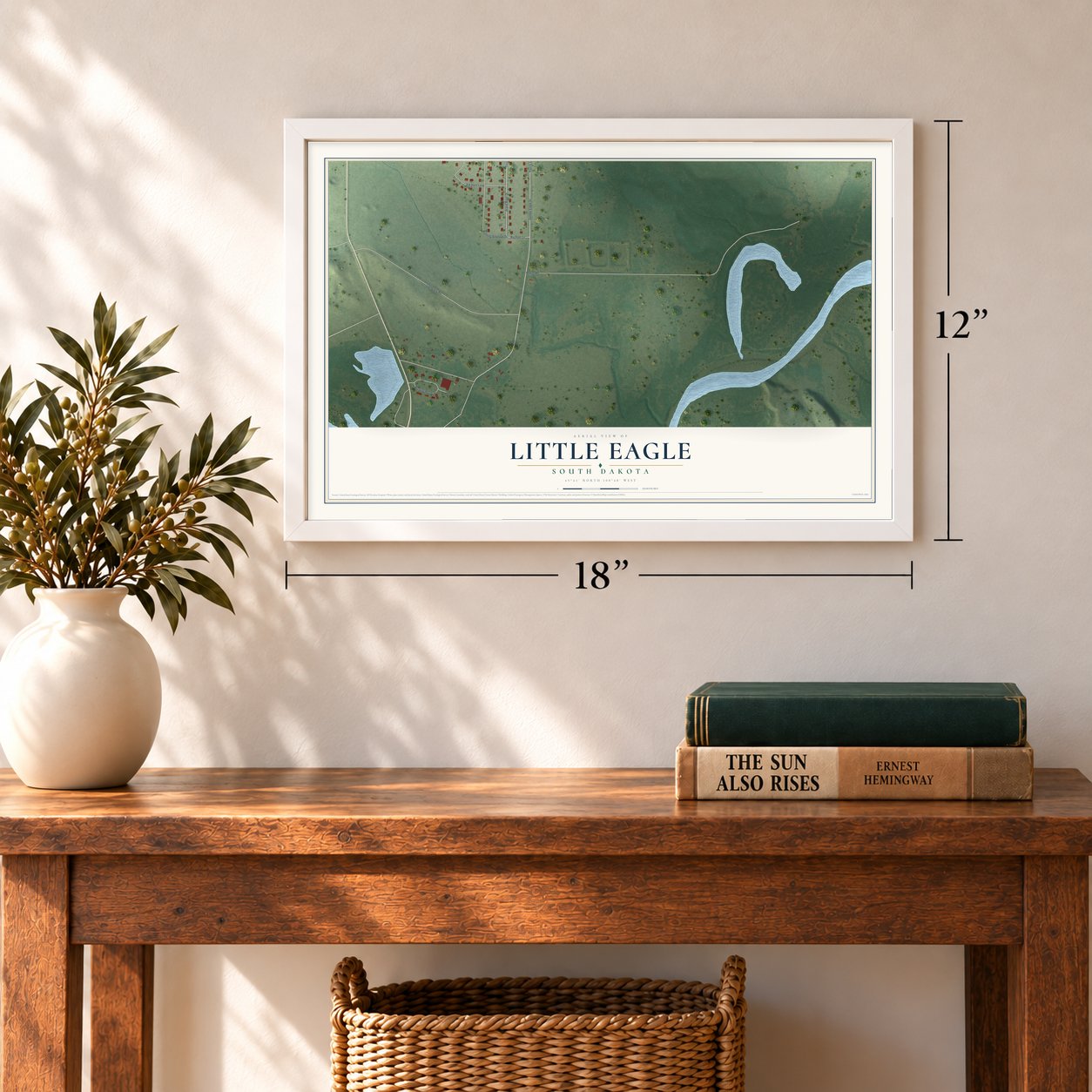 Little Eagle, South Dakota map, 12 x 18 inch print in a white frame in an entryway