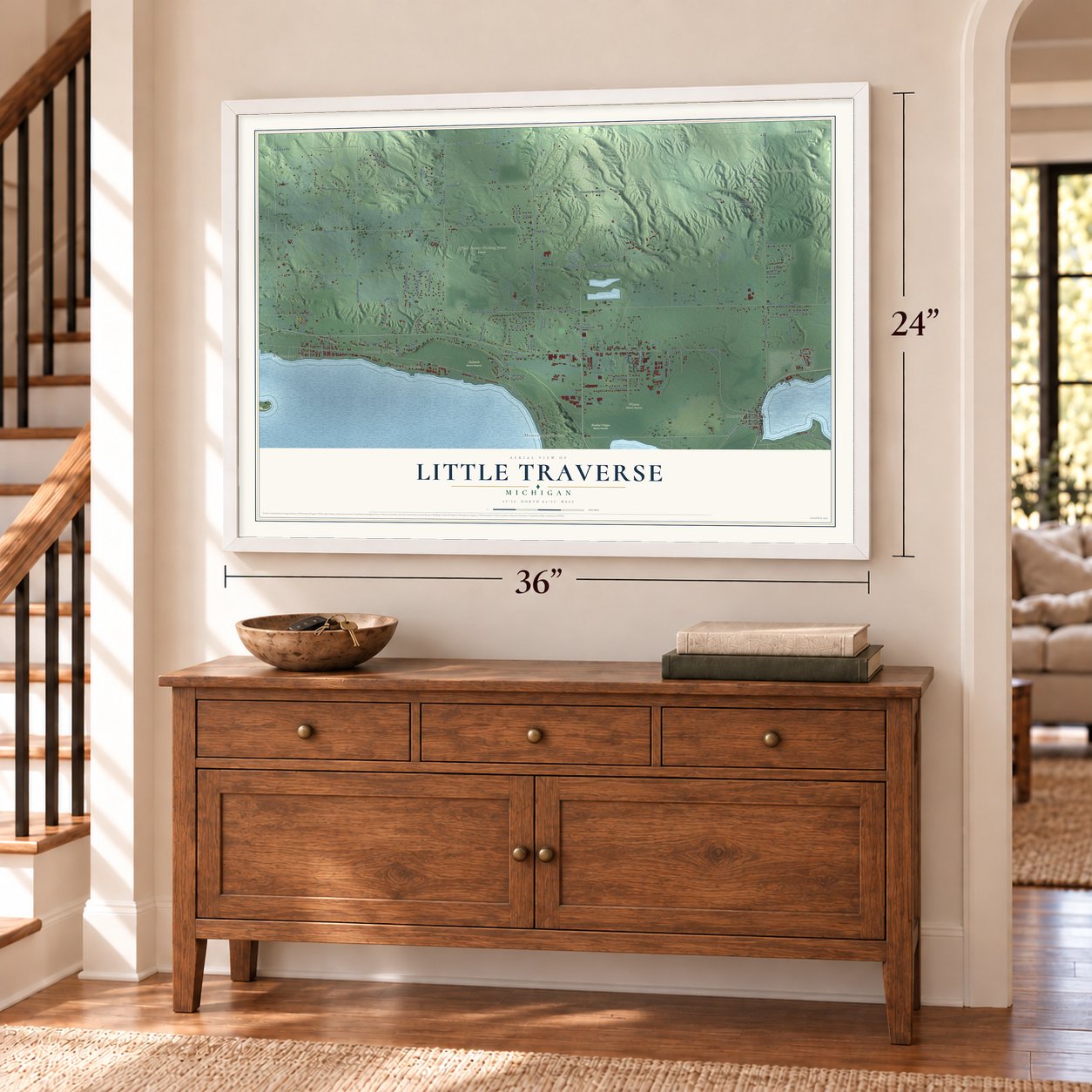 Little Traverse, Michigan map, 24 x 36 inch print in a white frame above a dresser by a staircase