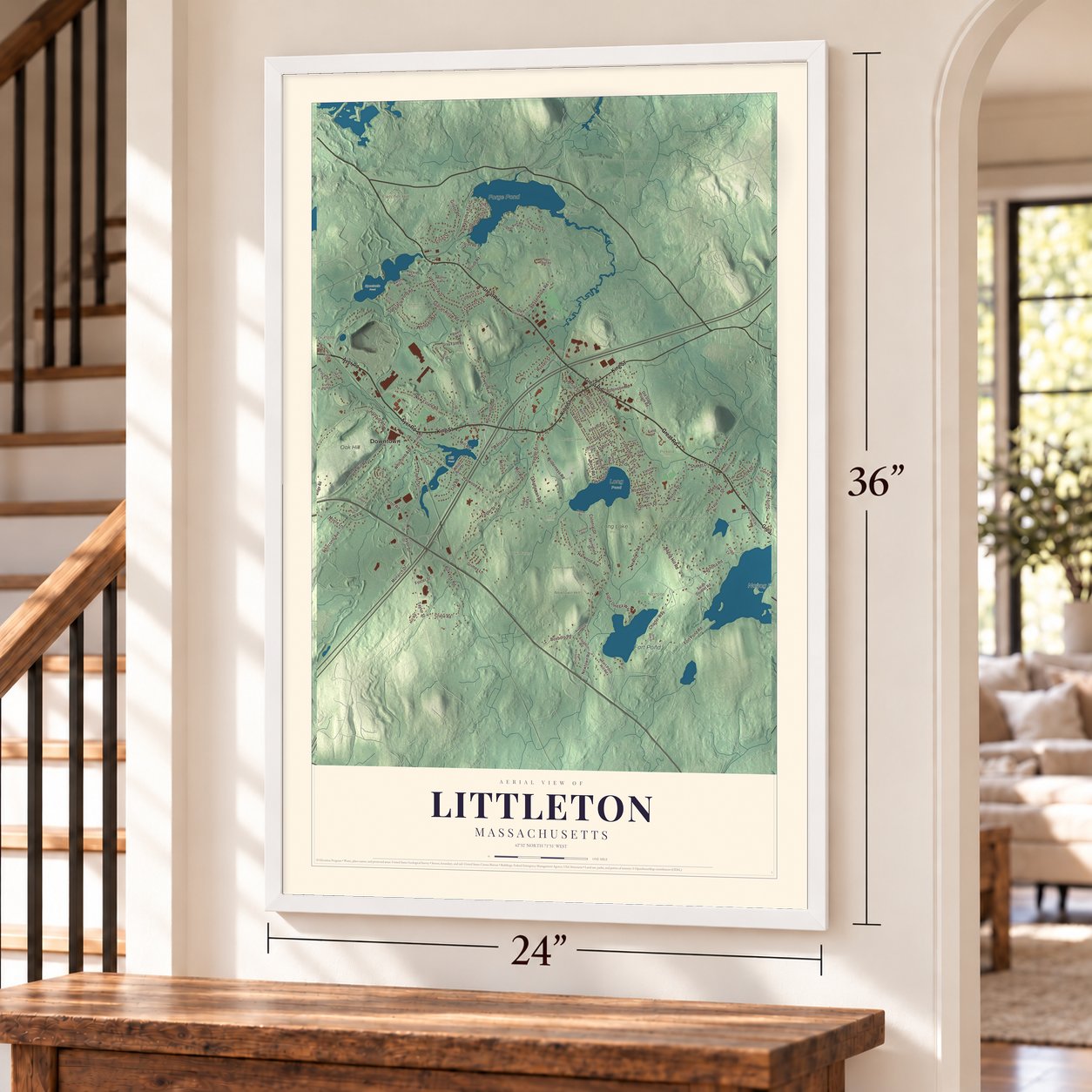 Littleton, Massachusetts map, 24 x 36 inch print in a white frame by a staircase